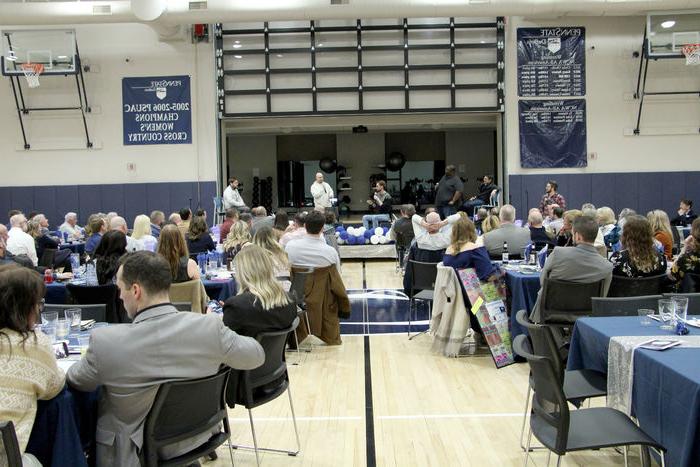 A wide view of Happy Valley Improv performing on stage at the PAW Center during the Lions, Legacy and Laughter event during We Are Weekend at Penn State DuBois.